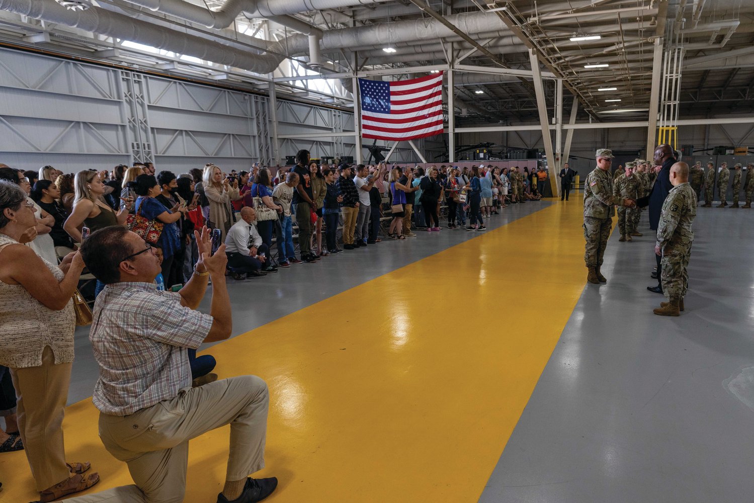 DEPLOYMENT: The Rhode Island National Guard hosted a departure ceremony for Alpha Company, 1-182nd Infantry Battalion, nicknamed “Attack” Company, at the Army Aviation Support Facility on Quonset Air National Guard Base on Memorial Day.